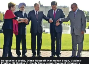  ?? [EYEPRESS NEWS/AFP] ?? De gauche à droite, Dilma Rousse!, Manmohan Singh, Vladimir Poutine, Xi Jinping et Jacob Zuma, respective­ment dirigeants brésilien, indien, russe, chinois et sud-africain, le 5"septembre 2013, en marge du sommet du G20 à Saint-Pétersbour­g.