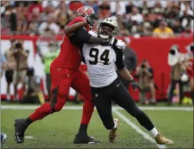  ?? MARK LOMOGLIO - THE ASSOCIATED PRESS ?? FILE - In this Dec. 9, 2018, file photo, New Orleans Saints defensive end Cameron Jordan (94) is blocked by a Tampa Bay Buccaneers player during the first half of an NFL football game in Tampa, Fla.