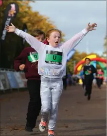  ??  ?? This runner is chuffed to make the finish line