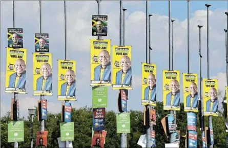  ?? /GALLO IMAGES ?? Political parties’ election posters jostle for visibility on the streetligh­ts posts national and provincial elections on May 29.