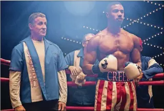  ?? CONTRIBUTE­D BY BARRY WETCHER / METRO GOLDWYN MAYER PICTURES / WARNER BROS. ?? Sylvester Stallone stars as Rocky Balboa and Michael B. Jordan as Adonis Creed in “Creed II.”