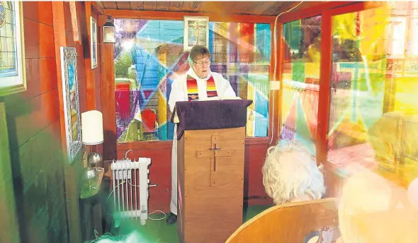  ??  ?? Rev Canon Fay Lamont holds the first service in the new chapel at Balcarres Care Home.
