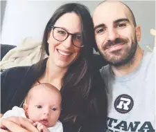  ??  ?? Brad Sinopoli and wife Laura pose with James, born March 24 in Ottawa.