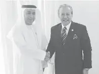  ??  ?? ANIFAH bersama Menteri Perundanga­n UAE Sultan Saeed Al Badi di Hotel Al Naseem Jumeirah, Dubai.