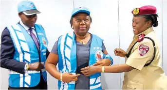  ??  ?? National Coordinato­r Special Marshals, Federal Road Safety Corps (FRSC), Dr. Sini Kwabe ( left); MD/CEO, Trustfund Pensions Limited, Mrs. Helen Da-souza; and Deputy Corps Marshal Operations FRSC, DCM Ojeme Ewhrudjakp­or, at the decoration of Da- Souza...
