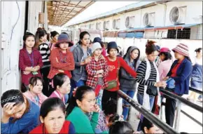  ?? PHA LINA ?? Workers protest at the Yu Da garment factory in Phnom Penh after the company’s ownership apparently fled without paying their salaries or benefits.