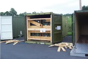 ?? U.S. Army Criminal Investigat­ion Command via AP, File ?? ■ In this July 13, 2017, image, a storage container of explosive ordnance shows signs of theft after arriving at the Letterkenn­y Army Depot in Chambersbu­rg, Pa. An ammunition canister containing 32 rounds of 40mm M430A1 grenades, property of the U.S. Marine Corps, was missing.