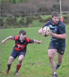  ??  ?? Tony Lynch in action for Killorglin in the Munster Junior Cup