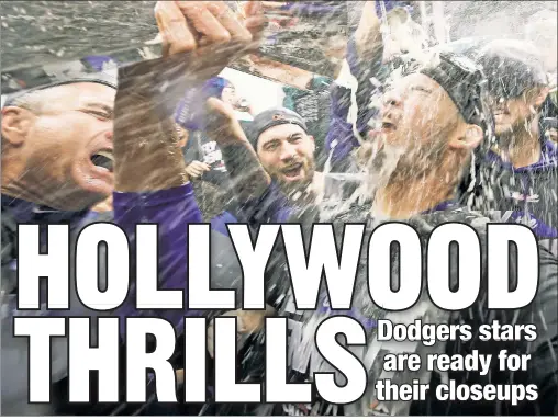  ?? Getty Images ?? CHEERS! The Dodgers celebrate in the clubhouse after clinching a spot in their first World Series since 1988 with an 11-1 win over the Cubs in Game 5 of the NLCS on Thursday night.