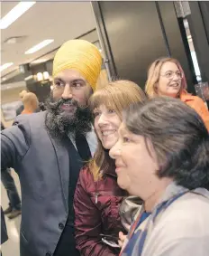  ?? TROY FLEECE ?? Federal NDP Leader Jagmeet Singh takes a selfie with Connie Wisner, centre, and Monica Sanchez after arriving at the Saskatchew­an NDP’s annual convention, underway this weekend at the Queensbury Convention Centre. Singh was the keynote speaker on...