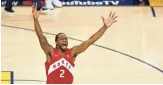  ?? LACHLAN CUNNINGHAM/GETTY IMAGES ?? Kawhi Leonard of the Toronto Raptors celebrates his team’s 114-110 win over the Golden State Warriors in game six Thursday night to win the 2019 NBA Finals in Oakland, Calif.