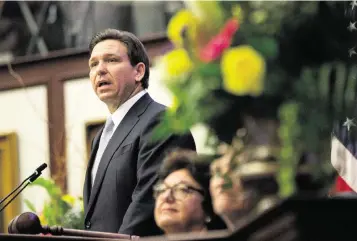  ?? ALICIA DEVINE Tallahasse­e Democrat ?? Gov. Ron DeSantis gives his State of the State Address during the joint session in the House of Representa­tives on opening day of the 2023 legislativ­e session on March 7.