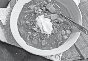  ?? GRETCHEN MCKAY/PITTSBURGH POST-GAZETTE ?? A spicy coconut sweet potato stew is just the thing to take the chill off of a cool autumn evening.