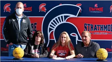  ?? RECORDER PHOTO BY NAYIRAH DOSU ?? Strathmore High School’s Paulina Cemo, second from right, signed a letter of intent to play women’s water polo at Biola University, Thursday, Dec. 3, 2020, at Strathmore High.