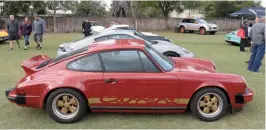  ??  ?? Bottom left: Cris Huergas (RIP), founder of the R Gruppe, owned this numbersmat­ching ’69 911S
Bottom middle: Parked in their own corner, the 912s made a colourful display
Bottom right: A Rothsport 3.5litre engine motivates this ’73 911 RSR Tribute