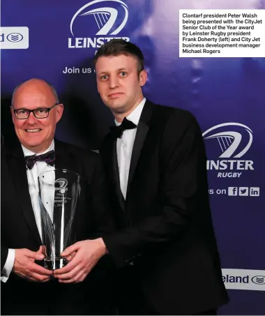  ??  ?? Clontarf president Peter Walsh being presented with the CityJet Senior Club of the Year award by Leinster Rugby president Frank Doherty (left) and City Jet business developmen­t manager Michael Rogers