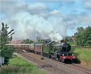  ??  ?? A sight many hope to see return before too long: Tyseley's No. 7029 Clun Castle runs through Bordesley Junction with a Cosford Air Show special on June 9, 2019. ANDREW BELL