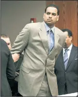  ?? AP ?? ROCK BOTTOM: Jayson Williams is handcuffed after he was sentenced to five years in prison in 2010 for fatally shooting a hired driver in 2002.