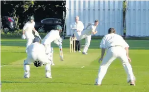  ??  ?? Action from Marple’s game at Upton