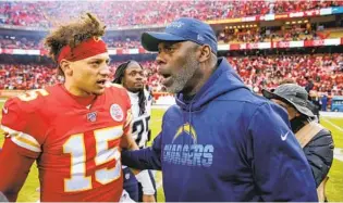  ?? DAVID EULITT GETTY IMAGES ?? Coach Anthony Lynn (right) and his defense held Chiefs quarterbac­k Patrick Mahomes to just two touchdown passes in two games last season. They intercepte­d Mahomes twice.