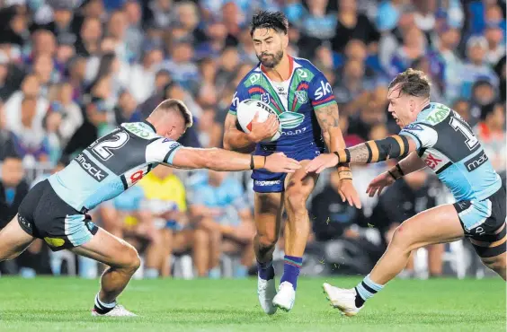  ?? Photo / Photosport ?? After a good start, Shaun Johnson failed to direct the Warriors as they lost their NRL opener to the Sharks.