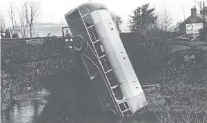  ??  ?? Not the destinatio­n intended, this bus has ended up in the river. See more at the top of the column.