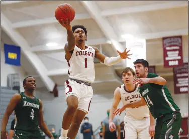  ?? Associated Press ?? Driving: Colgate's Jordan Burns (1) drives past Loyola (Md.) during an NCAA college basketball game in the finals of the Patriot League Tournament Sunday in Hamilton, N.Y.