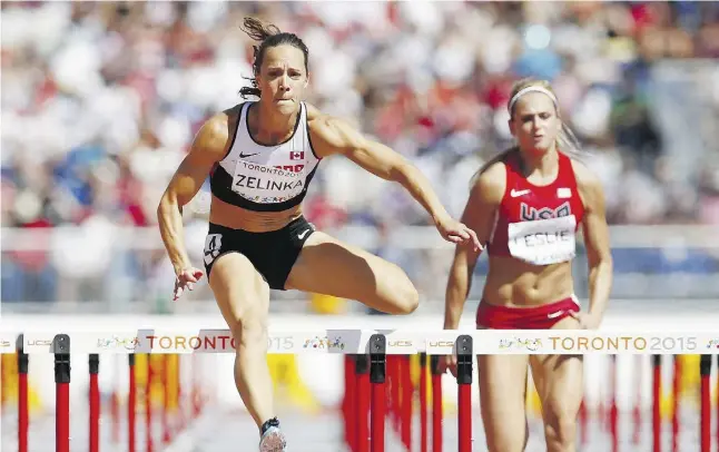  ?? Mark Blinch / The Cana dian Pres ?? Jessica Zelinka of Canada competes in the women’s 100-metre hurdles in the heptathlon during athletics at the Pan Am Games in Toronto on Friday.