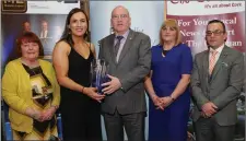  ??  ?? Bríd O’ Sullivan presenting an Adult Club Person Award to Sean Corcoran representi­ng Speakeasy Toastmaste­rs Bridie Murphy, Siobhan Murphy and Pat Whelan.