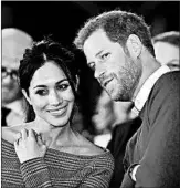  ?? BEN BIRCHALL/GETTY-AFP ?? Britain’s Prince Harry and fiancee Meghan Markle watch a dance performanc­e in Wales last month.