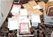  ?? DEPARTMENT OF JUSTICE ?? A photo of documents seized during the Aug. 8 FBI search of former President Donald Trump’s Mar-a-Lago estate. Since the search, he insisted he did nothing wrong and argued he declassifi­ed the info.