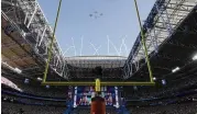  ?? ASSOCIATED PRESS ?? The first all-female-piloted military flyover flies over State Farm Stadium before Super Bowl LVII on Sunday.