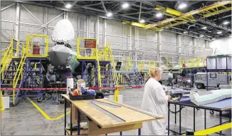  ?? RODGER MALLISON / FORT WORTH STAR-TELEGRAM ?? An F-35 jet is built in August at Lockheed Martin Aeronautic­s in Fort Worth. The state production index, a key measure of factory activity, rose to a reading of 4.8 in October from an essentiall­y flat 0.9 the prior month, according to the Texas...