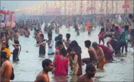  ?? PTI FILE ?? Devotees take a holy dip in the Ganga during the Mauni Amavasya festival in Allahabad.