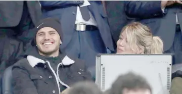  ?? — Reuters photo ?? Inter Milan’s Mauro Icardi with Wanda Nara in the stadium before the match.