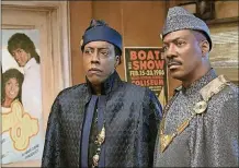  ??  ?? Arsenio Hall (left) and Eddie Murphy in “Coming 2 America,” the sequel.