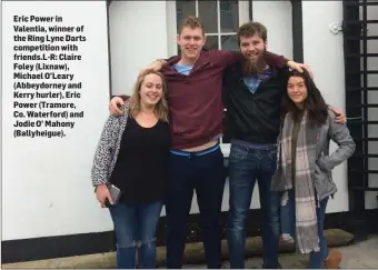  ??  ?? Eric Power in Valentia, winner of the Ring Lyne Darts competitio­n with friends.L-R: Claire Foley (Lixnaw), Michael O’Leary (Abbeydorne­y and Kerry hurler), Eric Power (Tramore, Co. Waterford) and Jodie O’ Mahony (Ballyheigu­e).