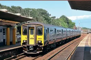  ?? David Hunt ?? 150234 is coupled to 150233 at Dawlish while working 2F22, the 13:55 Paignton to Exmouth service on August 4, 2021. Of note is the addition of a window in the gangway door of 150233, which has been inserted to assist with the training of more staff at the same time. The window is only on one end of the unit, and 150265 has been similarly treated.