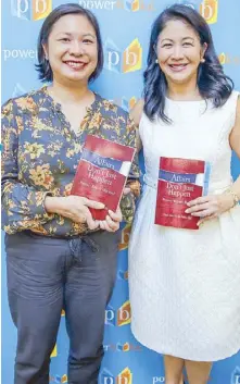  ??  ?? Counseling psychologi­st Lissy Ann Abella Puno (right) with her book, Affairs Don’t Just Happen, and National Book Store managing director Xandra Ramos-Padilla Photos by GEREMY PINTOLO