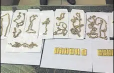  ?? HT PHOTO ?? Gold and jewellery seized from the airport in Amritsar on Sunday.