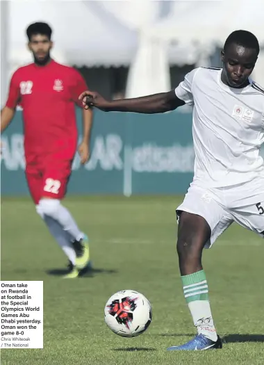  ?? Chris Whiteoak / The National ?? Oman take on Rwanda at football in the Special Olympics World Games Abu Dhabi yesterday. Oman won the game 8-0