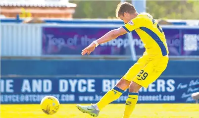  ?? Picture: SNS. ?? Graham Cummins wraps up the 3-0 victory over Inverness on Saturday.