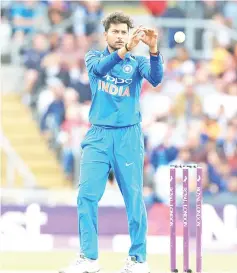  ?? — AFP photo ?? Kuldeep Yadav catches the ball during the third One Day Internatio­nal (ODI) cricket match against England, at Headingley Stadium in Leeds, northern England.