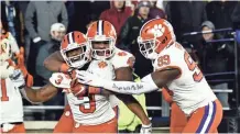  ?? BRIAN FLUHARTY/ USA TODAY SPORTS ?? Clemson wide receiver Amari Rodgers (3) celebrates with teammates after scoring a TD on a punt return against Boston College.