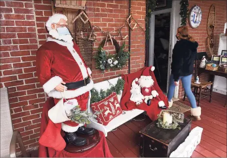  ?? Arnold Gold / Hearst Connecticu­t Media ?? The Holiday Selfie Station set up on the back porch of Walker Loden in Madison on Dec. 4.