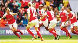  ??  ?? OH YES: Danielle Carter, third left, celebrates in the FA Cup final