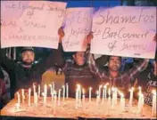  ?? WASEEM ANDRABI/HT ?? Protesters during a candleligh­t vigil in Srinagar on Friday against the Kathua rape and murder.