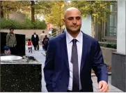  ?? AP PHOTO BY LAWRENCE NEUMEISTER ?? Former sports radio host Craig Carton leaves Manhattan federal court Wednesday, Nov. 8, in New York after being convicted of fraud for diverting money from investors in a ticket reselling business for his own needs, including gambling expenses.