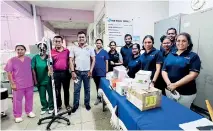  ?? ?? Members from the CA Sri Lanka YCAF handing over the medical equipment to the Lady Ridgeway Hospital