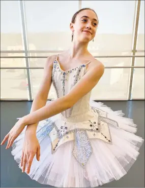  ?? Victoria Mazzarelli / Contribute­d photo ?? Gianna LaRoche, a Nutmeg Ballet resident student from Massachuse­tts, models the new Snow Queen costume for this year’s “Nutcracker,” opening Dec. 7 at the Warner Theatre in Torrington.